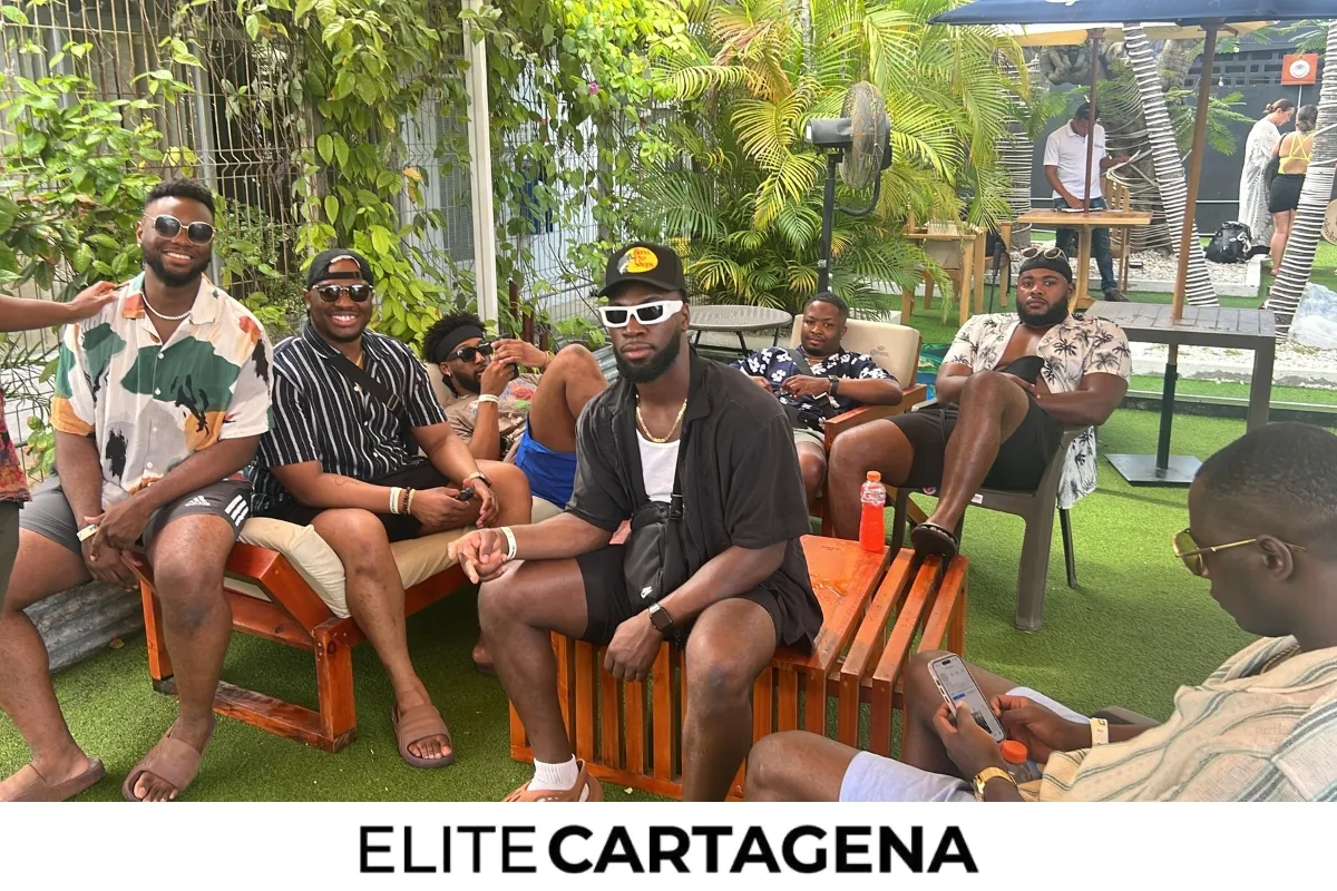 A group of people enjoying a safe and private pool party in Cartagena, illustrating a worry-free vacation.